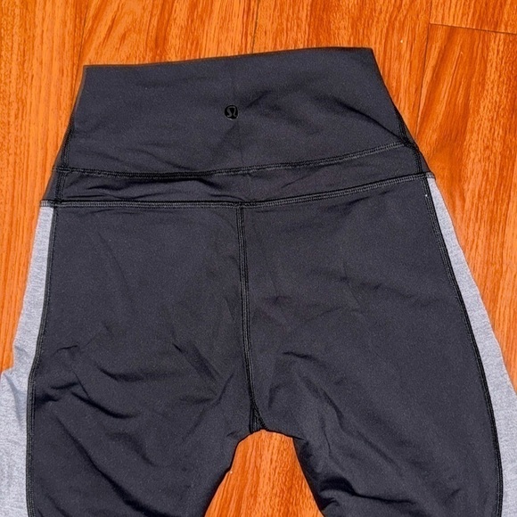 Lululemon Retreat 7/8 Pant Black / Heathered Slate size 4  leggings black logo - Picture 10 of 15